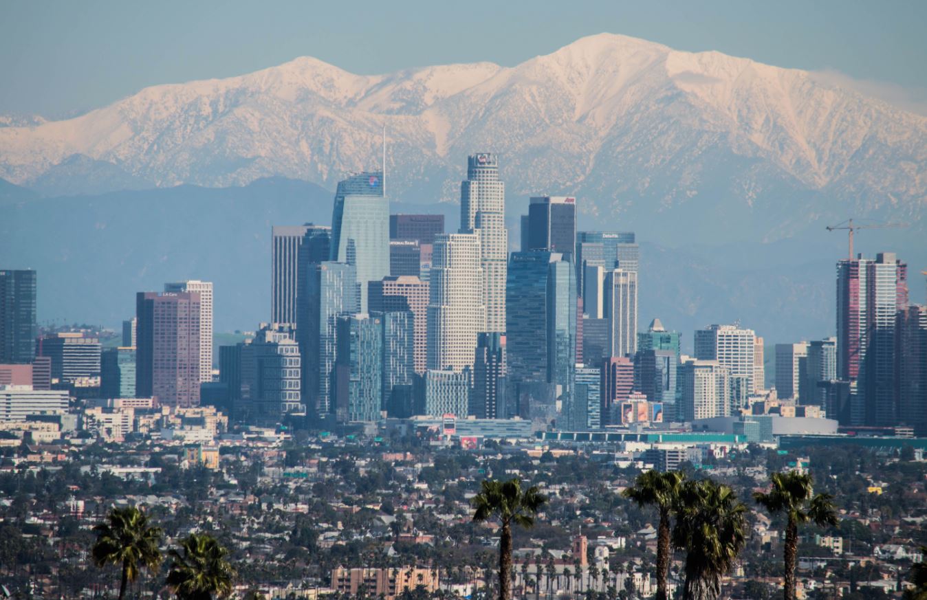 Golden stairway leading upward through mist into the skyline